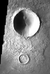 Two impact craters in this image help us to determine their relative ages. The smaller crater to the south formed first. It was then filled with ejecta from the younger and larger crater just to the north. If the sequence had been reversed, the smaller crater would not be filled with debris. (NASA/JPL-Caltech/Arizona State University)