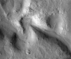 The winding channel of Huo Hsing Vallis has meanders like those in stream valleys on Earth. These suggest the valley was carved by flowing water. (NASA/JPL-Caltech/Arizona State University)